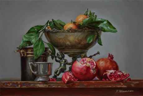 A vase of tangerines and pomegranates